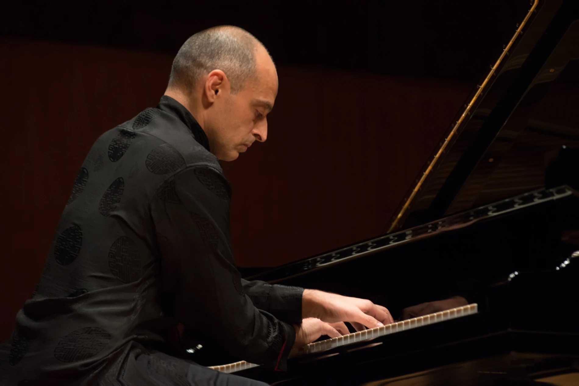 Ivan Yanakov at the grand piano in concert